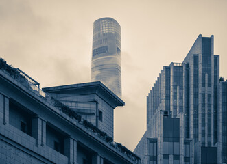 Naklejka premium Tower over the fog; blue colortone