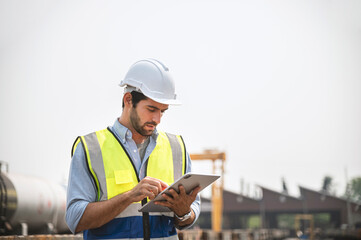 Railway engineer caucasian man are on duty and discussed by using tablet in the job site of train...