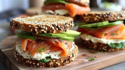 Delicious smoked salmon and avocado sandwiches on multigrain bread with cream cheese. Healthy lunch options, sandwich recipes, nutritious meals, gourmet snacks, brunch ideas.