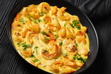 Sauteed Shrimp in creamy saffron sauce, top view