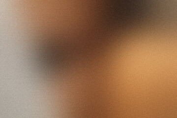 Grainy texture abstract background with a gradient blend of brown, orange, and grey tones