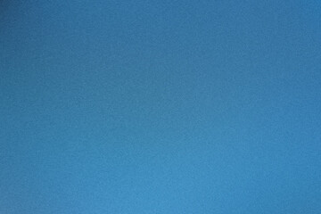 Blue textured background with a uniform grainy surface