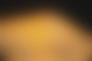 Grainy textured abstract background with a black to gold gradient blend © malshak_off