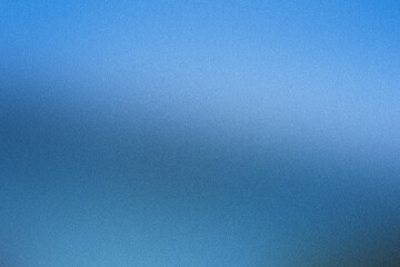 Subtle gradient on abstract blue background with fine grain texture