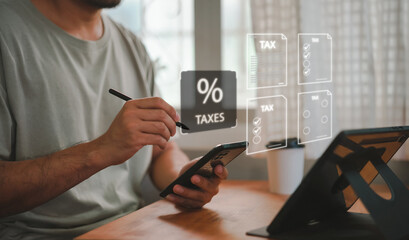 Tax and Vat concept. Government, state taxes concept. Businesman using calculator and laptop to...