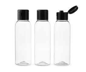 Three Clear Plastic Bottles With Black Caps on a White Background