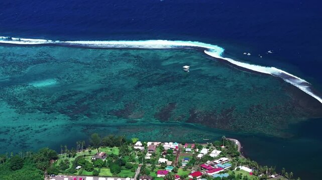 Coral reef break Teahupoo wave Tahiti French Polynesia aerial drone parallax coast morning sunny channel Papeete Paris Olympics 2024 surf surfer surfer venue judge tower circle right parallax motion