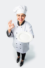 Indian asian Female Chef with Empty Terracotta Pot - High Angle View