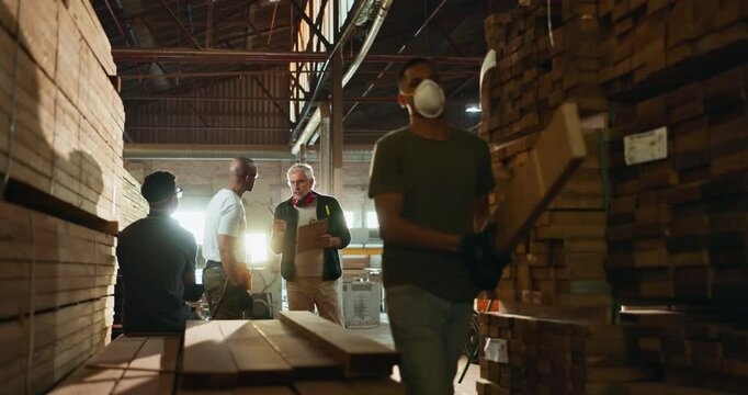 Men, management and meeting with wood, dust and carpenter in workshop for discussion and planning. Industry, woodwork group and warehouse with planks, manufacturing and collaboration at factory
