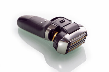 Healthcare Concepts. Closeup and Upper View of Of Modern Electric 5 Blades Stainless Steel Shaver...