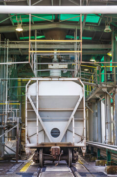 Rail cars being loaded with product