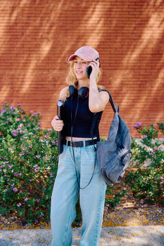 Student talking on phone outside