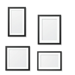 Four black picture frames, various orientations, empty, isolated, white background. Vector illustration