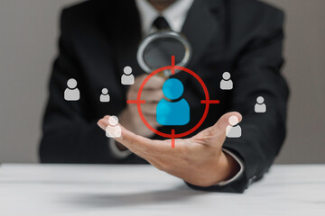 Businessman using magnifying glass with recruitment for  human resource in hand. Audit concept.