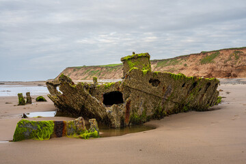 Stones on the beach and the ST Pasages Shipwreck between Ballasalla and Sartfield, Isle of Man