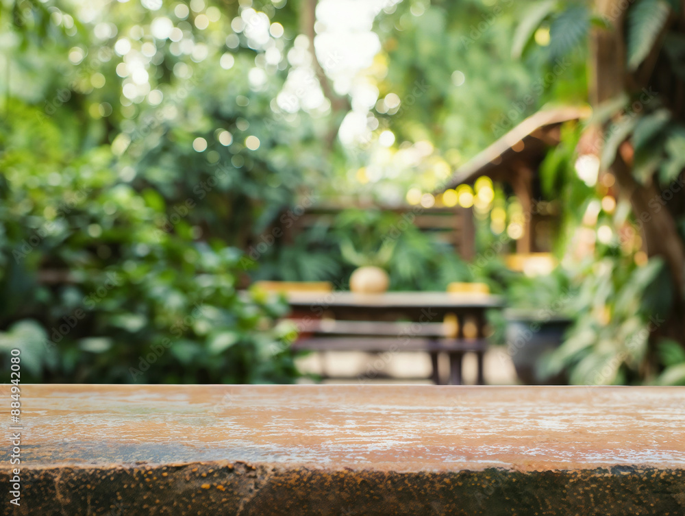 Poster empty rustic stone table top showcasing a tranquil view of outdoor furniture in a lush garden settin