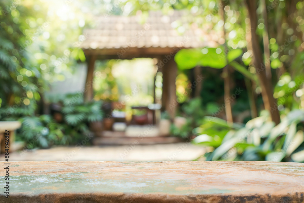 Aufkleber blurred green garden background displayed on empty wooden table top for product montage