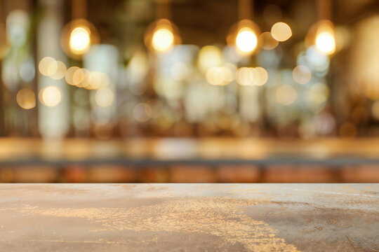 Empty table top with blurred restaurant background, ideal for product placement