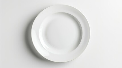 Empty white plate viewed from above on white background with clipping path