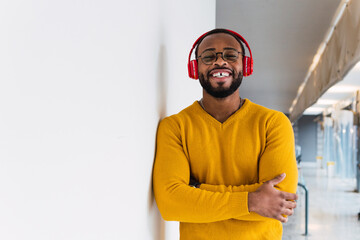 Portrait of afro african man listening music