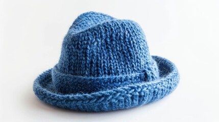 Handcrafted woolen hat in blue on a white background