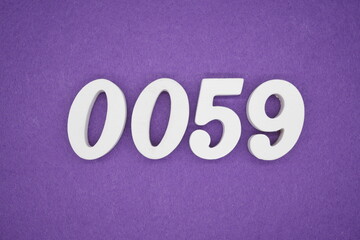 The numbers are made of white paint wood, placed on the background as a purple paper.