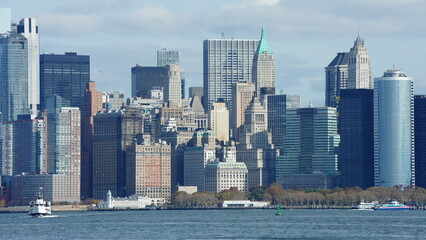 Fototapeta premium The New York manhattan view from the ferry boat in the sunny day