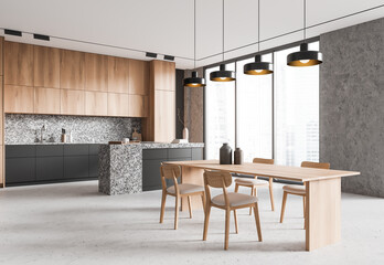 Stone home kitchen interior with bar island and eating table near window