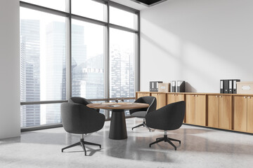 White office interior with meeting table and chairs, drawer and panoramic window