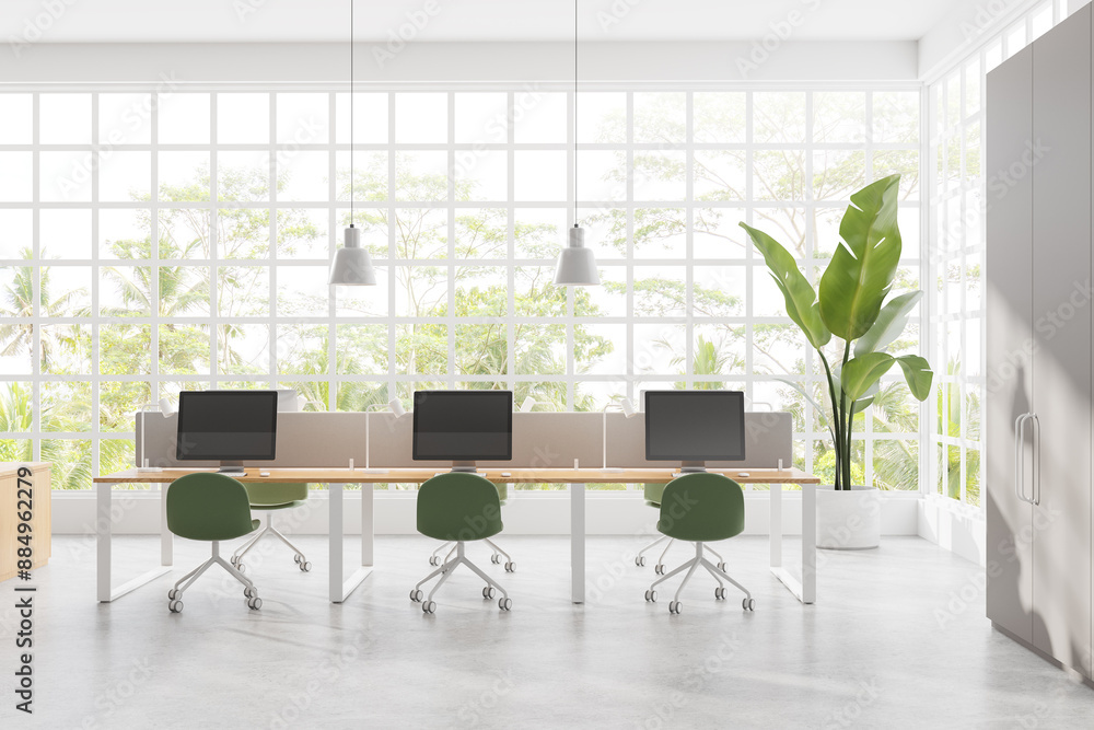 Sticker white office workspace interior with pc computers on desk near panoramic window