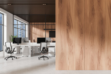 Modern office interior with wooden walls and ceilings, light background, concept of workspace...
