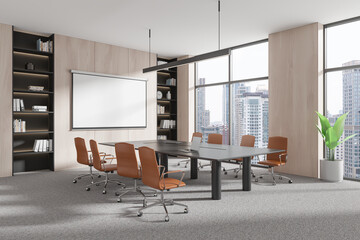 Meeting room interior with blank projection screen, panoramic window