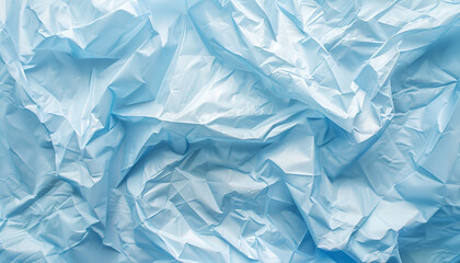 Fototapeta premium Crumpled light blue plastic bag as background, top view
