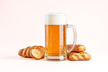 Glass of Beer with Pretzel Rolls