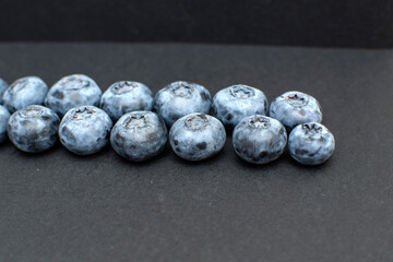 Fresh blueberry on black background