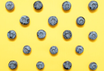 Fresh blueberry on yellow background