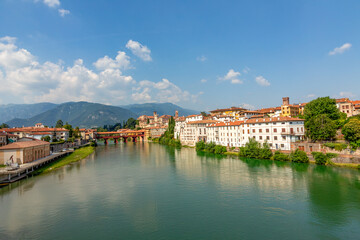 historic skyline of Bassano del Grappa with the Old wooden Bridge, also called ponte degli Alpini,...