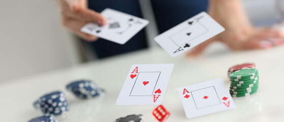 Close-up of playing cards for poker game, gamble games and casino. Profession player throwing trump...