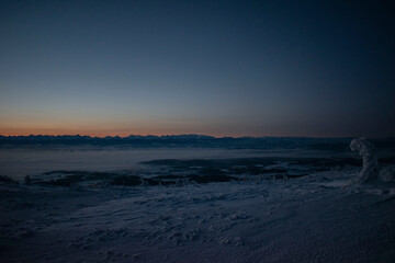 Obraz premium sunrise over the Tatra Mountains and snowy mountain peaks