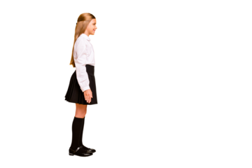 Full length body size profile side view of nice attractive lovely confident cheerful cheery straight-haired pre-teen girl standing straight copy space isolated on bright vivid shine yellow background