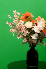 objects such as artificial flowers, decorative tools, teapots, cups