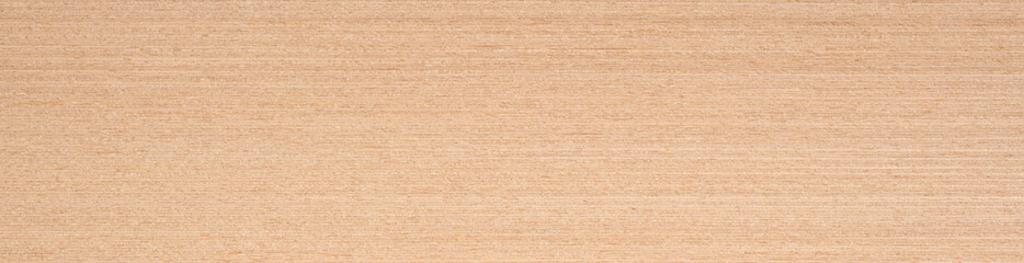 Subtle shades of beige and cream interweave across the smooth expanse of this beechwood veneer
