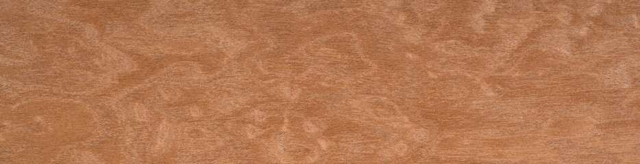 The warmth of cinnamon swirls across this cherry wood veneer, highlighting the intricate patterns nature can compose