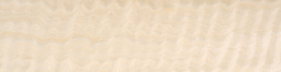 Gentle waves of creamy beige wash over the smooth surface of this ash wood veneer, suggesting serenity and natural elegance