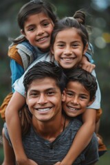 Fototapeta premium Happy couple giving piggyback rides to two young children, all smiling joyfully in a family moment of fun and bonding.