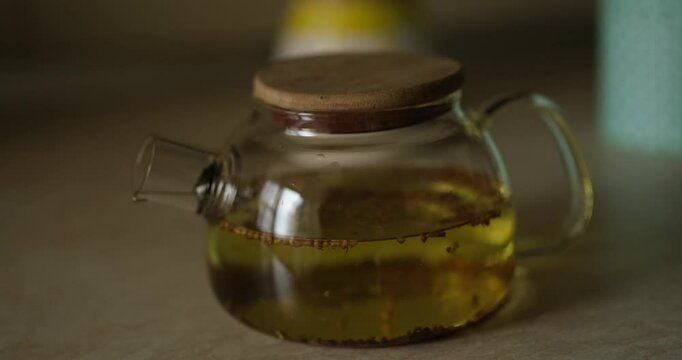 making green tea at the kitchen home table. Cosy home concept . High quality 4k footage