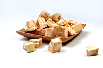 cut pieces of raw jack fruit, cooking preparations, isolated on white background