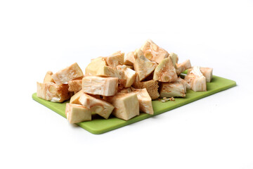 cut pieces of raw jack fruit, cooking preparations, isolated on white background