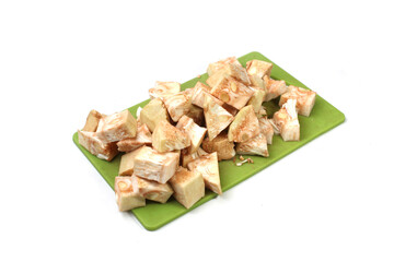 cut pieces of raw jack fruit, cooking preparations, isolated on white background