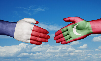 Maldives and France country handshaking with flags, consensus concept international co-operation illustration